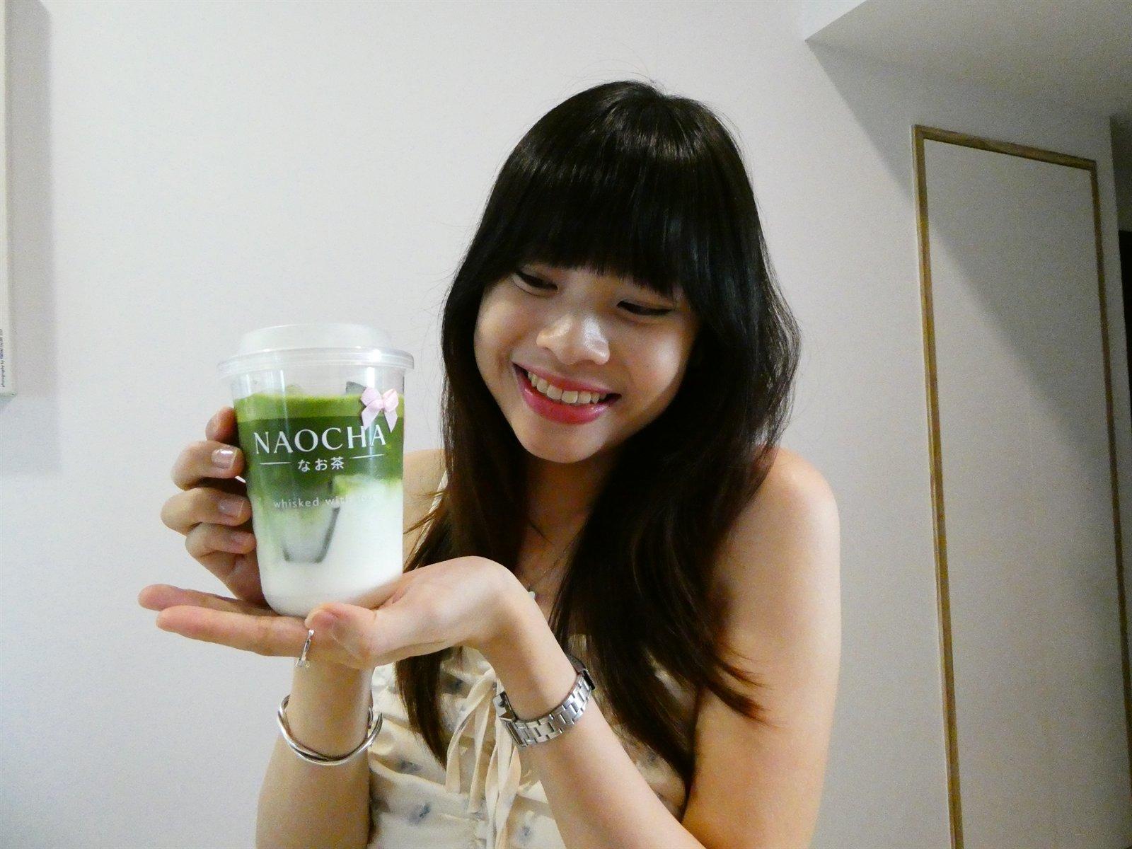 Holding a finished NAOCHA matcha