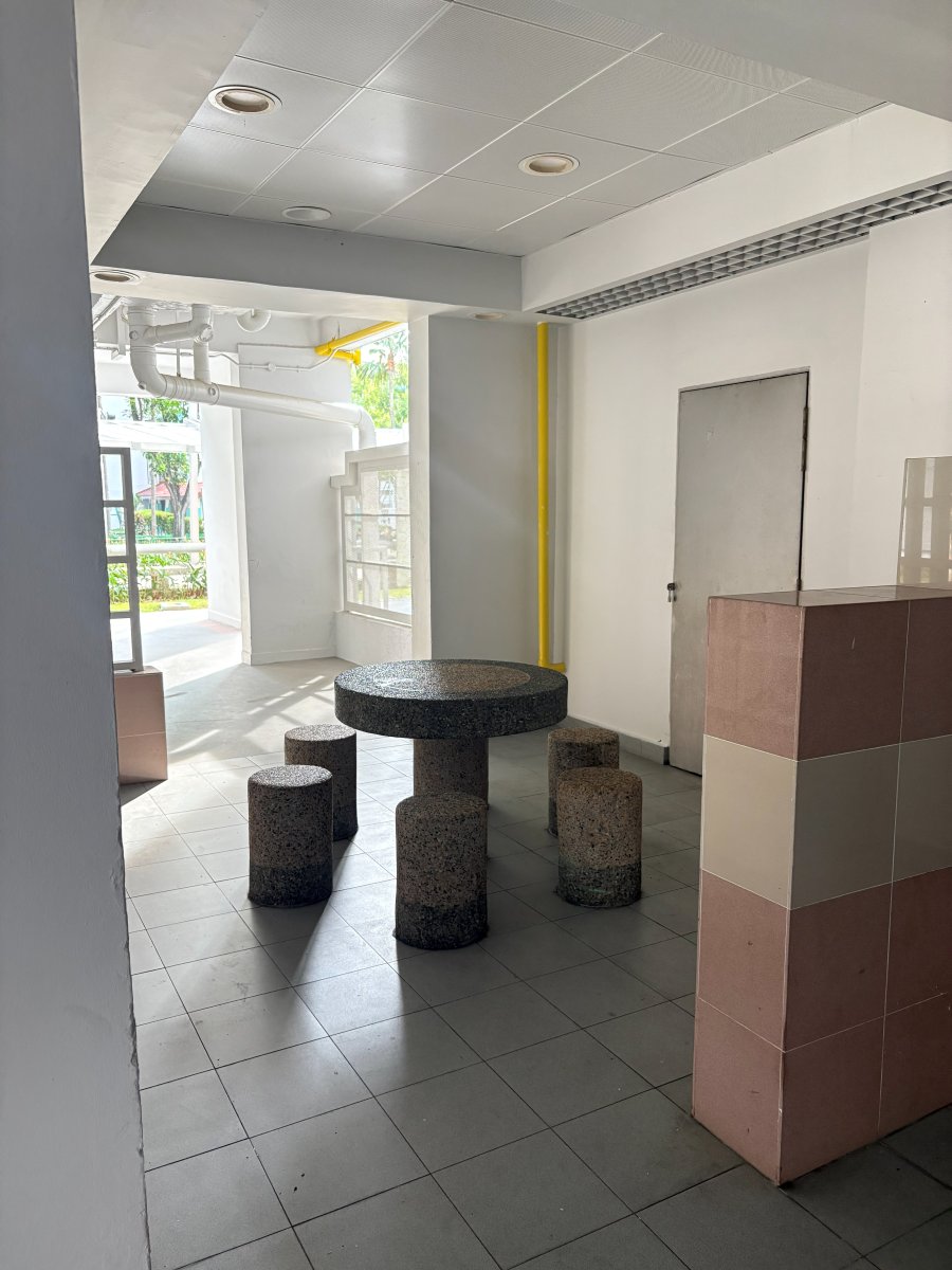 The void deck at Block 50 Sims Drive where NAOCHA orders are collected, beside the lift